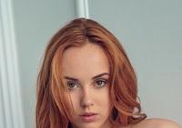 Beautiful Redhead Vos Holds Her Firm Tits After Taking Off Sensual Lingerie